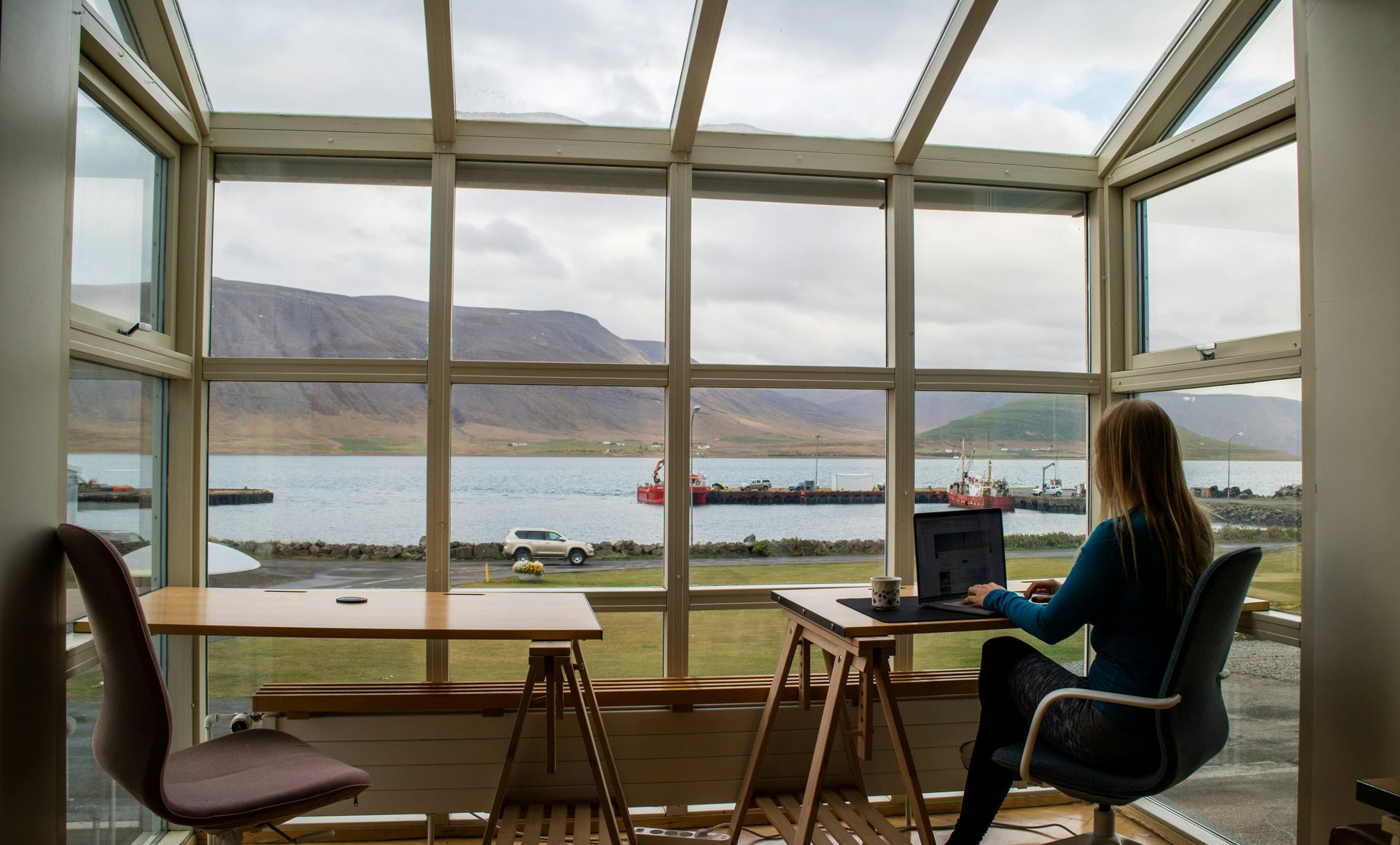A workspace with a view of a fjord. A quieter morning.